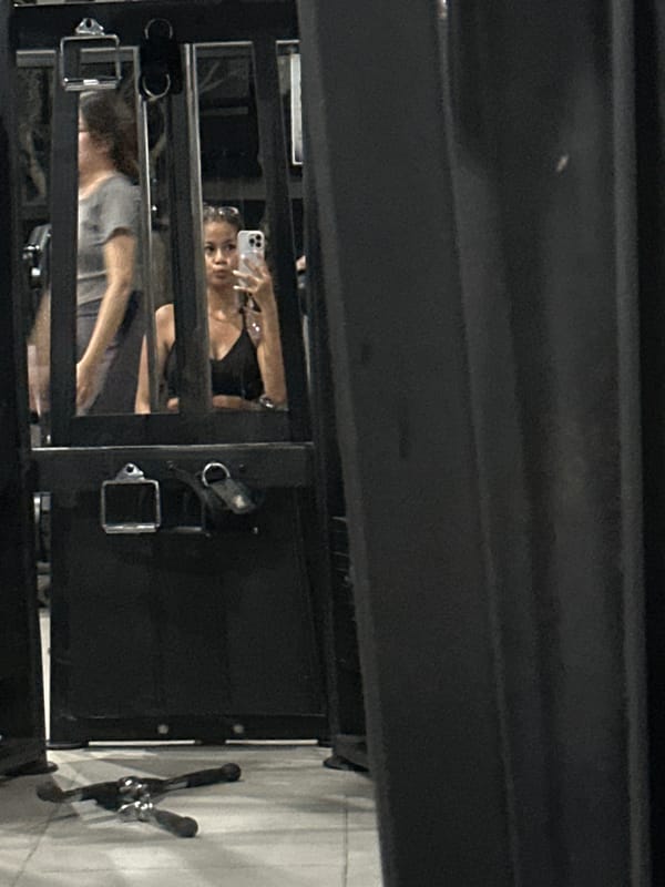 Woman completes gym workout session in Batubulan, Indonesia