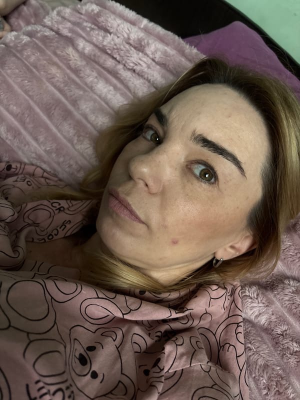 Relaxing on a pink blanket in a cozy Ladozhskoe Ozero bedroom