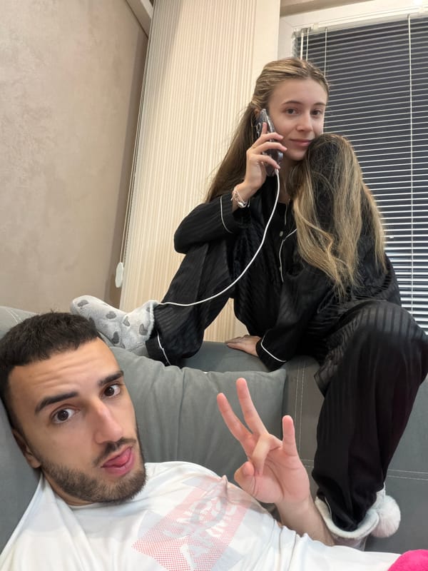 Two people relax on couch in Plovdiv home