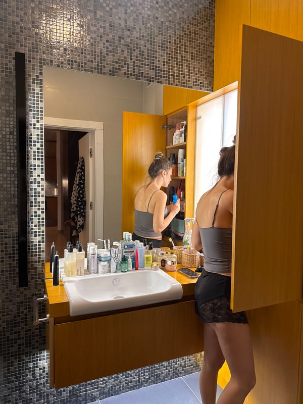 Woman conducts evening routine in Warsaw apartment