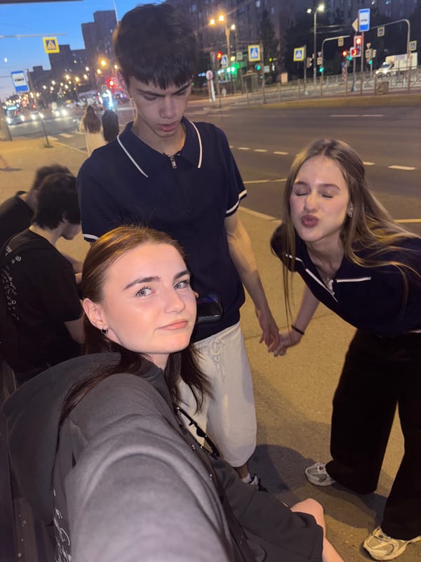 Young people socialize, take selfies during evening in Ladozhskoe Ozero