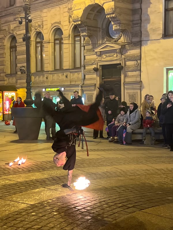 Fire performers entertain crowds in Saint Petersburg's Palace Square