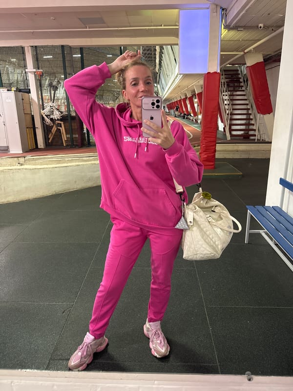 Woman takes selfie at sports facility in Murino, Russia