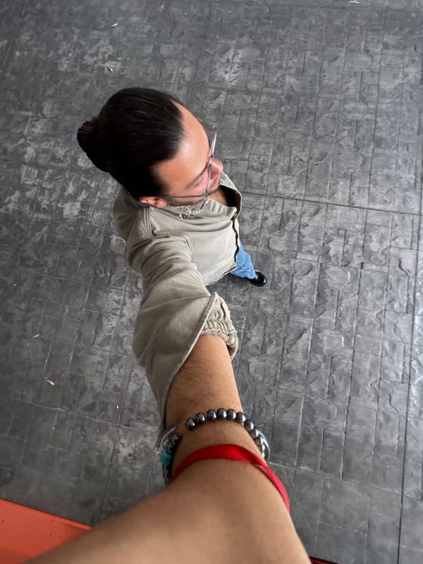 Person documented moving through modern building interior in Puebla