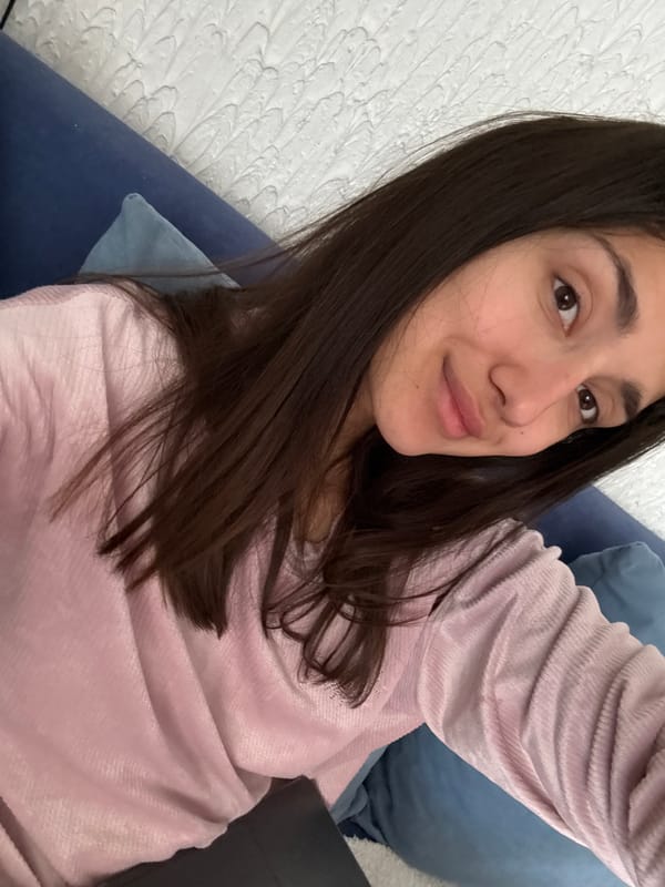 Woman and poodle captured in quiet morning moments, Sutomore