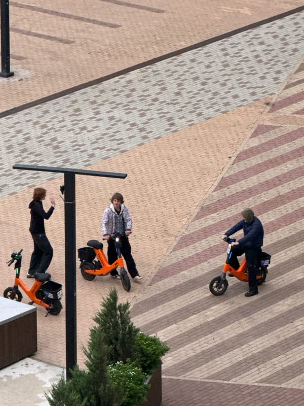 Everyday moments captured across Khimki including scooters and selfies