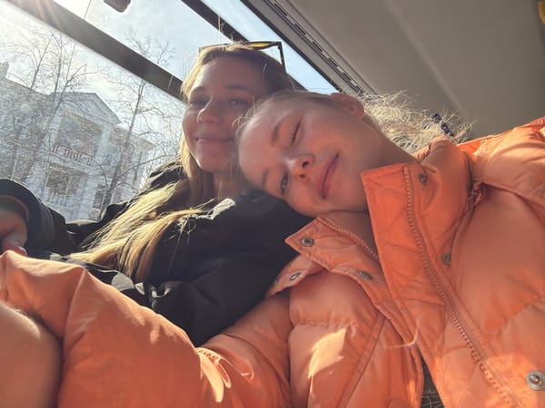Two women photographed together in vehicle in Berezniki
