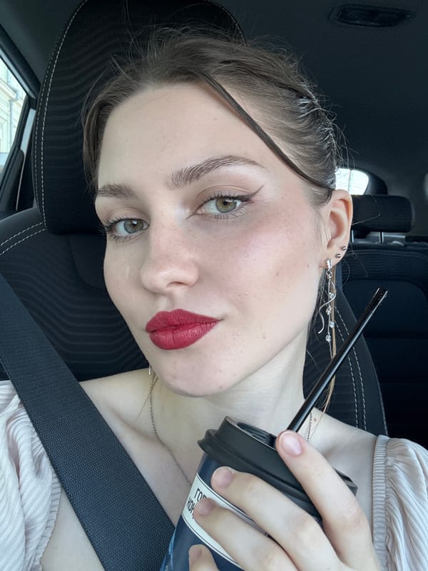 Woman Takes Selfie Inside Vehicle in Saint Petersburg