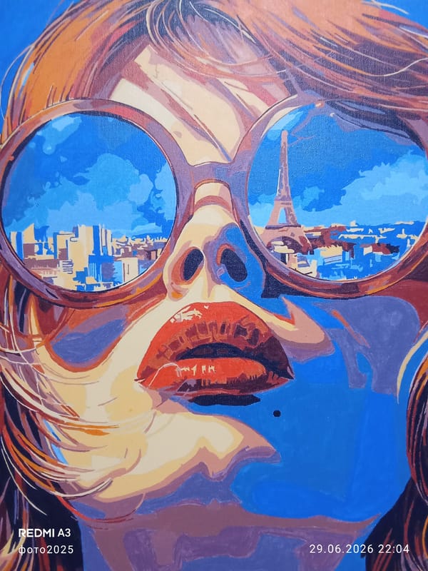 Cats, fish tanks, and paintings in a casual creative mix