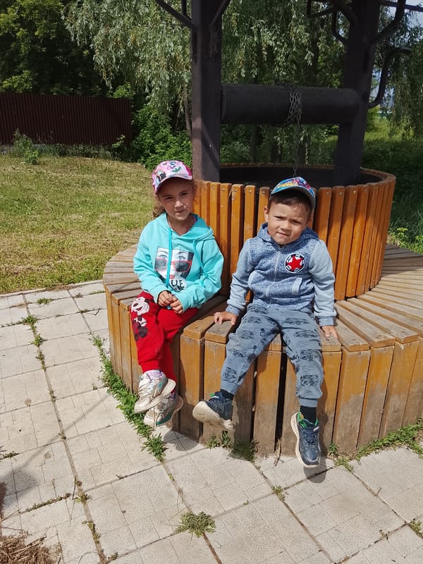 Morning scenes captured around Kuyeda, Russia include children and infrastructure