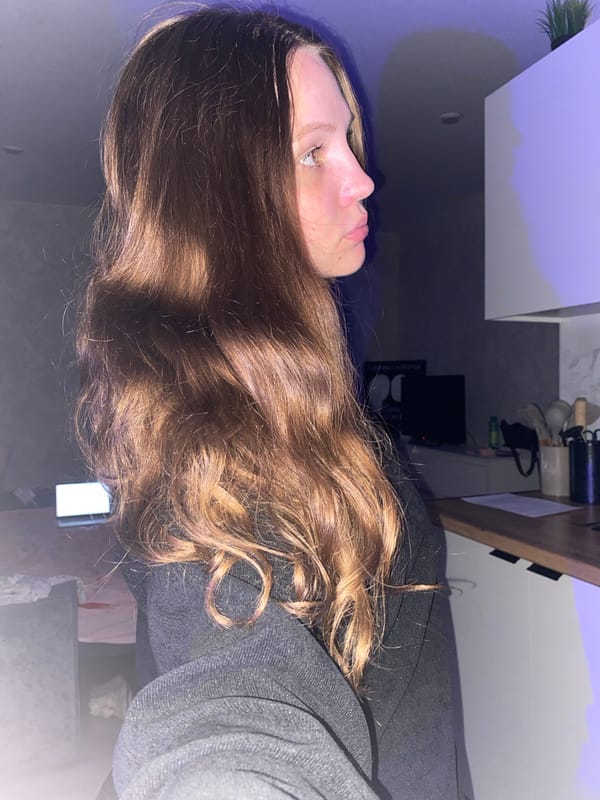 Woman photographed indoors during rainy evening in Izhevsk