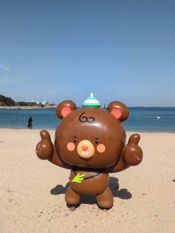 Witness documents sunny Ulsan beach scenes with cartoon installations