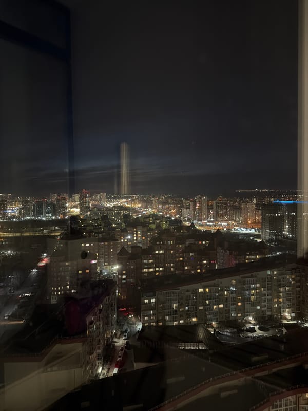 Night panorama of Krasnoyarsk cityscape captured from elevated viewpoint