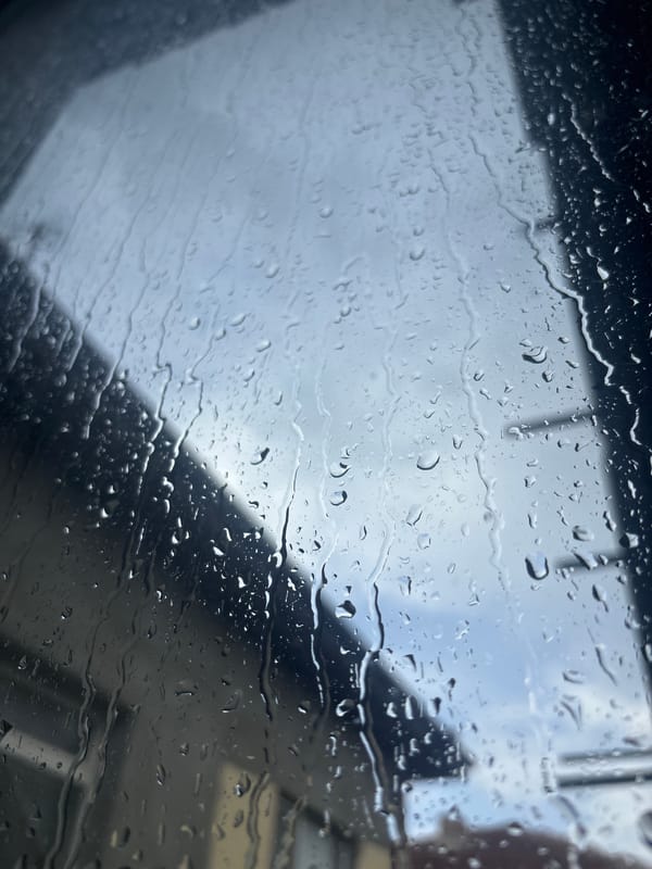 Morning rain observed through windows in Lom, Bulgaria