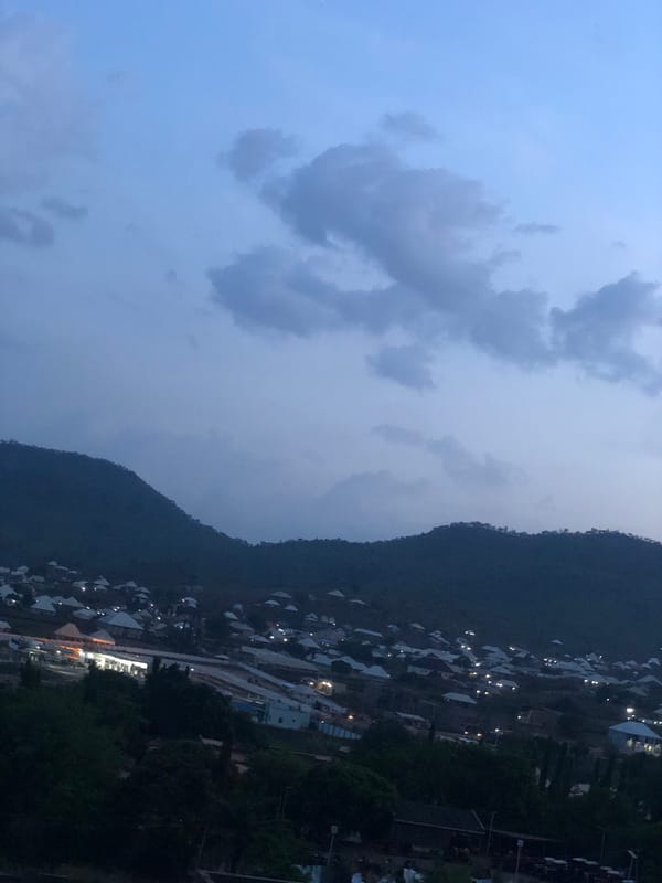 Mountainous settlement photographed at dusk by unknown witness