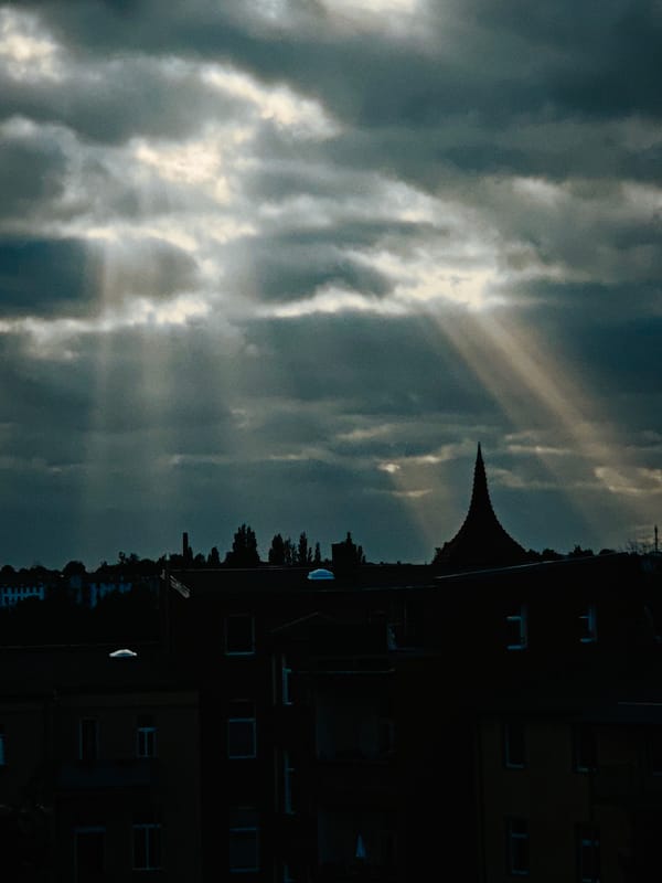 Schwerin summer Friday: stormy skies, sunflowers, and city views