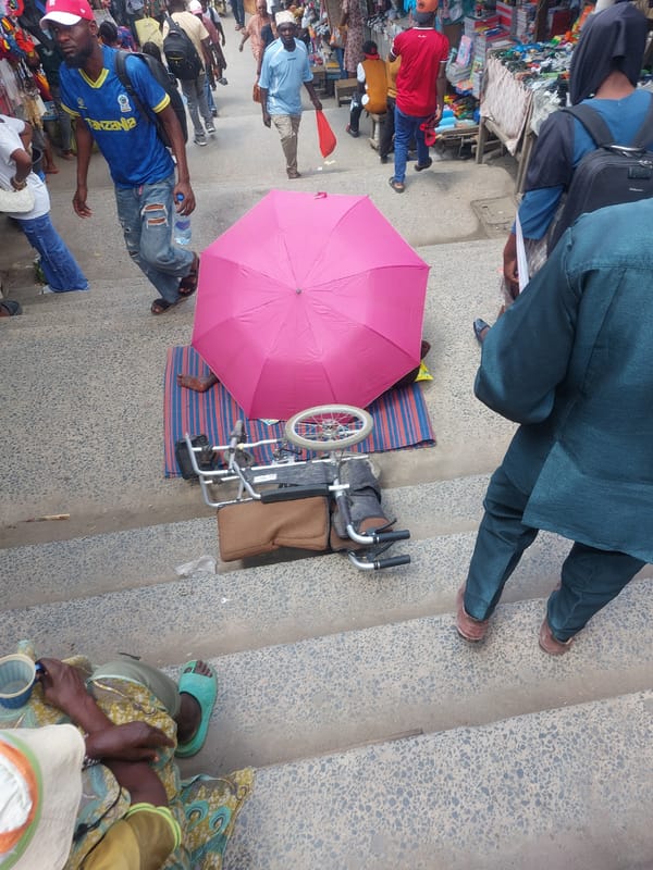 Morning street vendor activity at Dar es-Salaam transport hubs