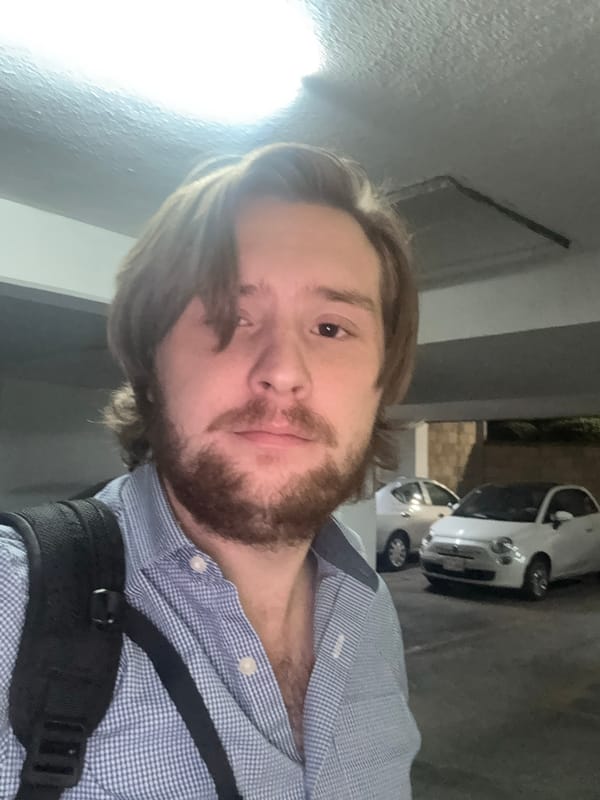 Person takes late-night selfie in Mexico City garage