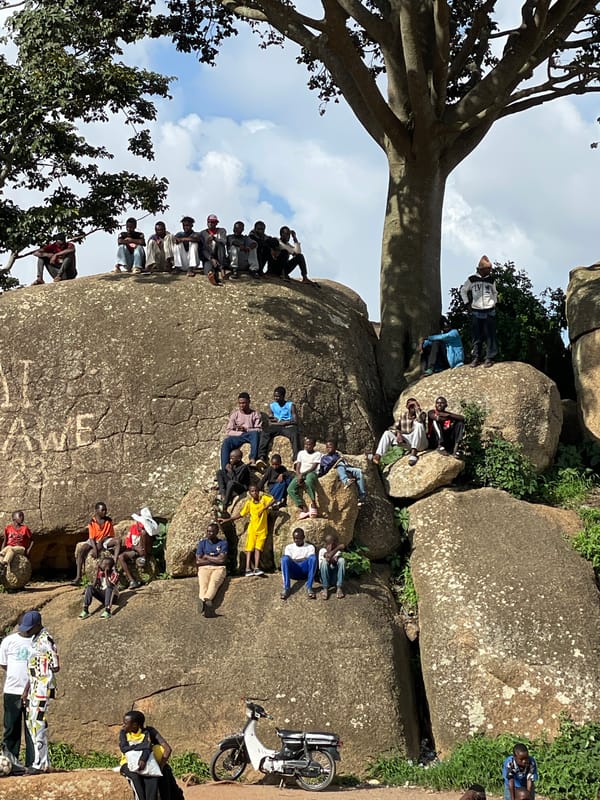 Soccer training session among Jos's rocky granite terrain
