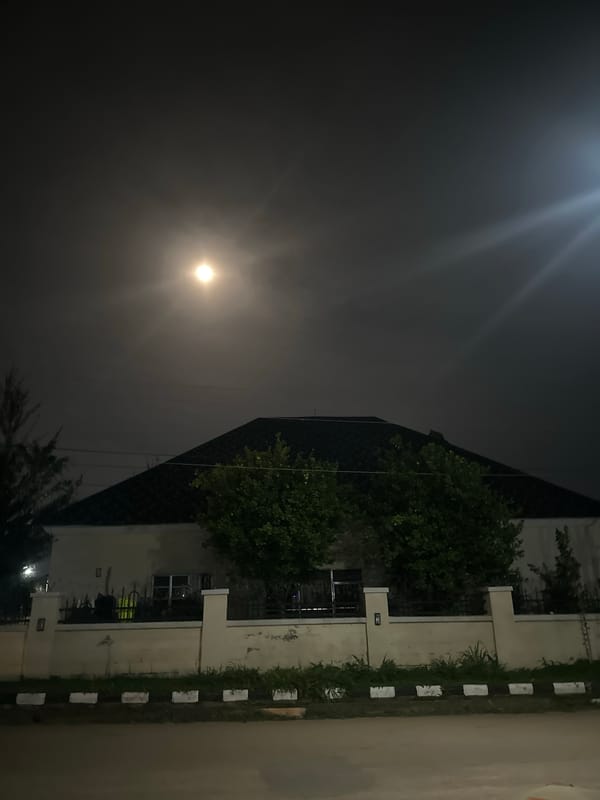 Moonlit streets and residential buildings in Abuja at night
