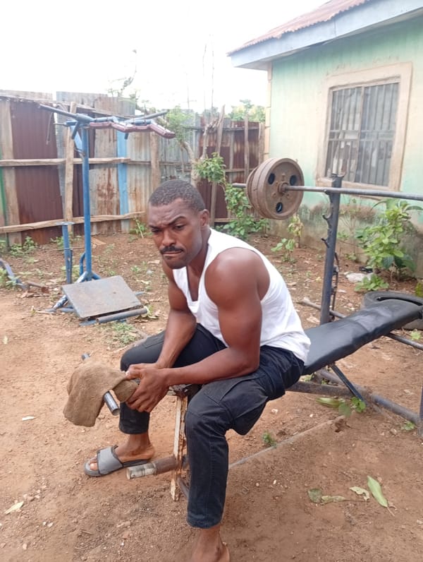 Men workout at makeshift outdoor gym in Akwanga Nigeria