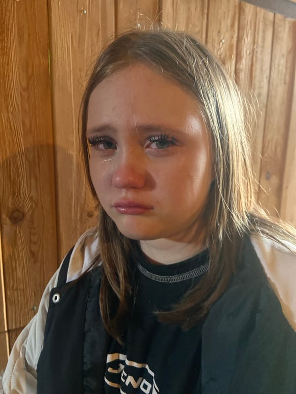 Young woman photographed indoors in Chaikovsky, Russia