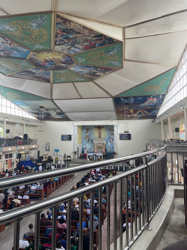 Church service draws crowds amid religious statuary display