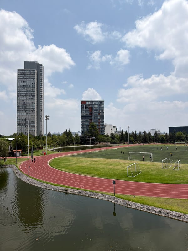 Soccer players active at Puebla recreational facility with track