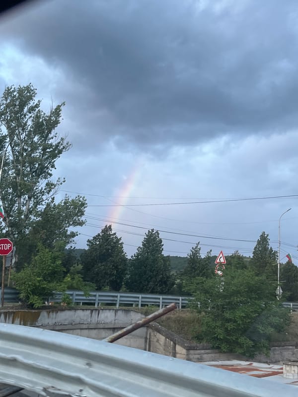 Rainbow appears over Simitli, Bulgaria amid cloudy skies