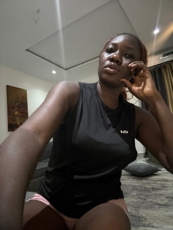 Woman photographed in residential setting, Iddo Tudunwada Nigeria