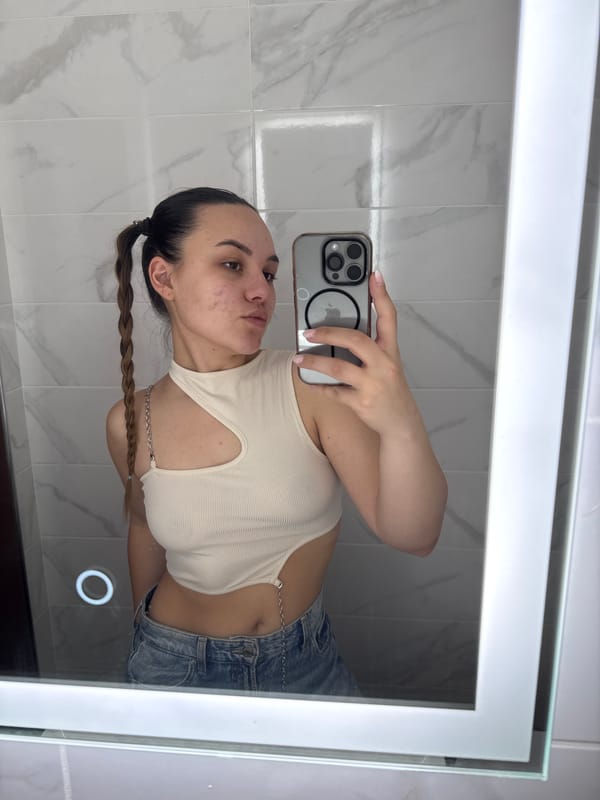 Person Takes Bathroom Mirror Selfie in Sofia