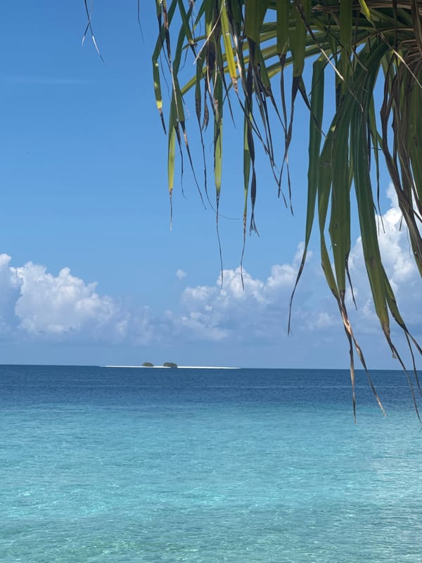Beach scenes captured in Ukulhas, Maldives showing shade structure