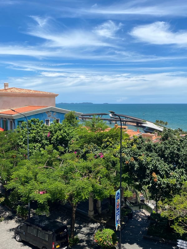Sun-soaked balcony views over Phú Quốc's coastal resort town