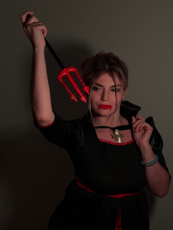 Woman poses for vampire costume portraits in Budva