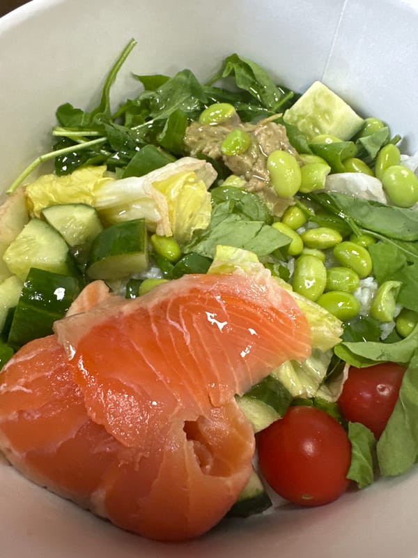 Salmon poke bowl, close up and overhead in Moscow