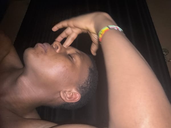 Late-night chill session in an Obosi bedroom, selfies and all