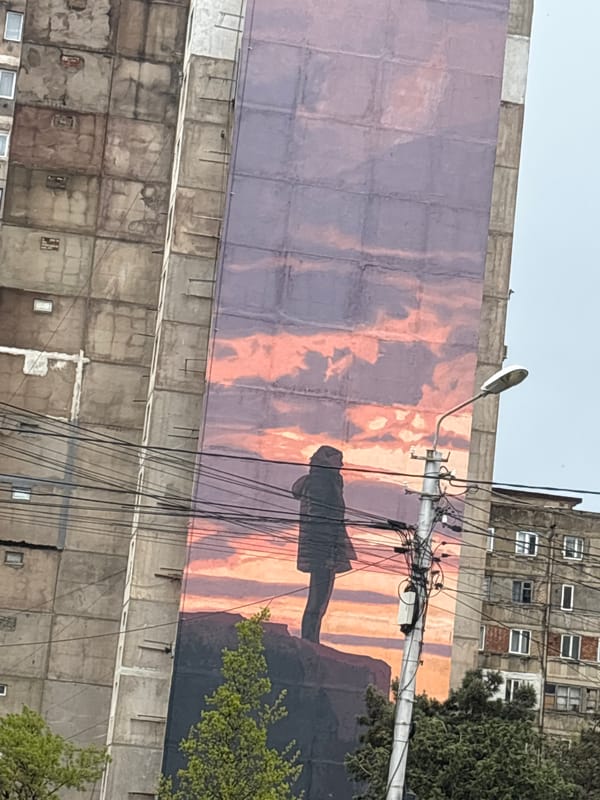 Street scene with sky mural observed in Tbilisi