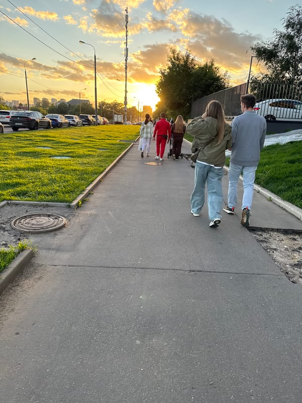 Golden hour walk along a Moscow pathway at sunset
