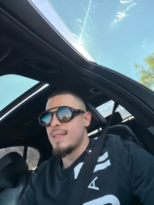 Man in sunglasses observed in car with sunroof in Bulgaria