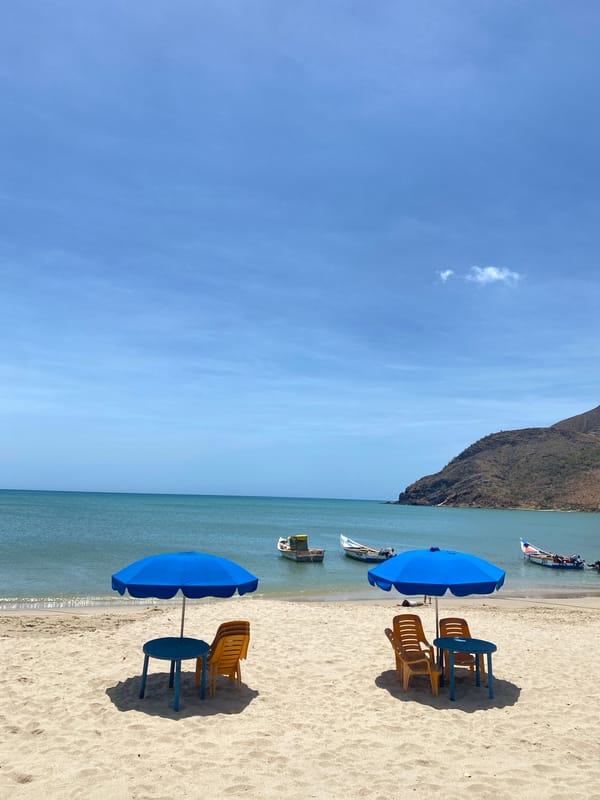 Beach furniture spotted along Juan Griego coastline