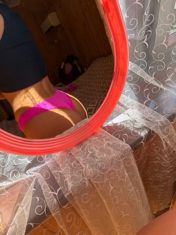 Mirror selfie session in a Sochi room, mid-June morning