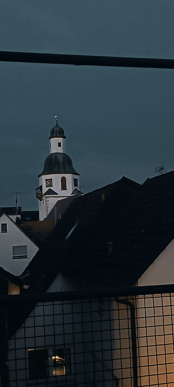 Evening views of Winnenden's church tower as dusk settles in