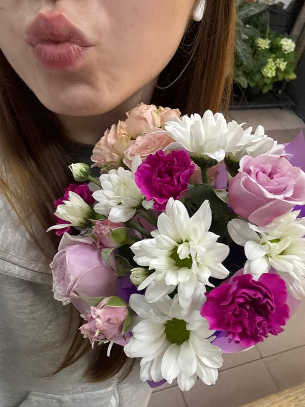 Flower bouquets in lavender baskets, close up and personal