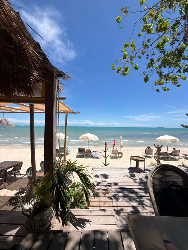 A relaxed morning scene along Baan Tai's beach and shoreline