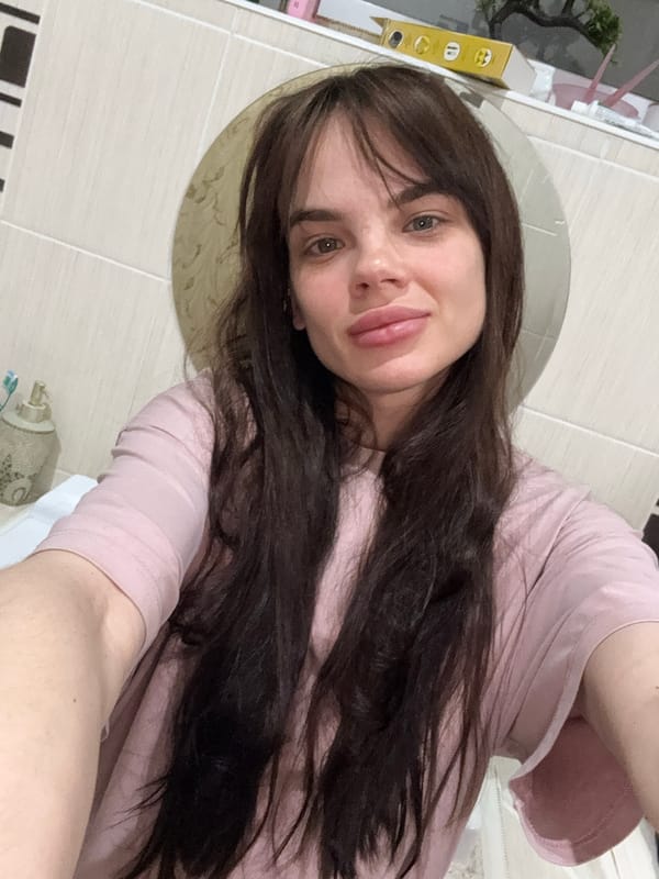 Woman Takes Multiple Mirror Selfies in Rostov-on-Don Apartment