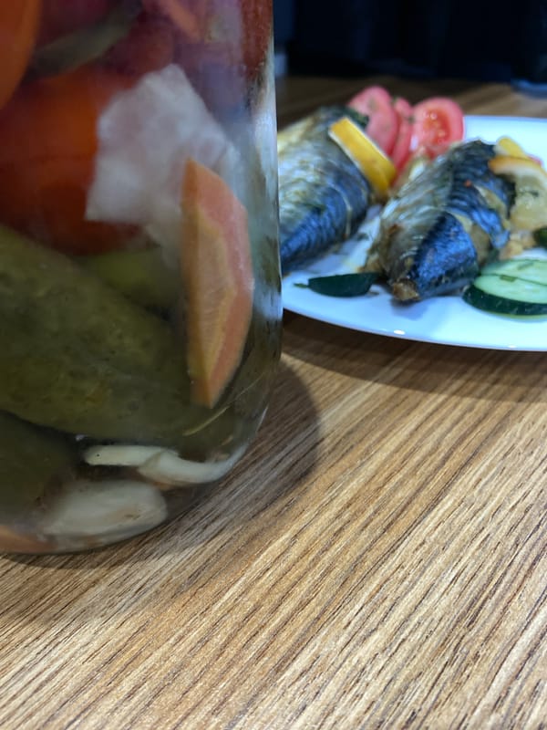 Tuymazy afternoon: rainbow skies, baked fish, and flower arrangements