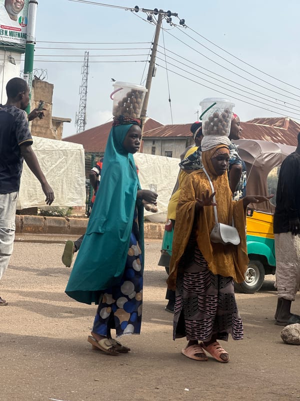 Morning street activity in Bukuru, Nigeria