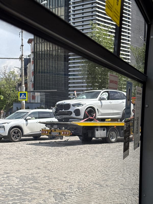 Damaged BMW towed from Sofia street after apparent accident
