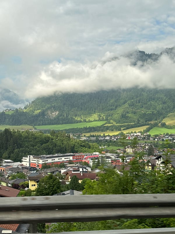 Overcast morning over forested mountain slopes in the Austrian Alps
