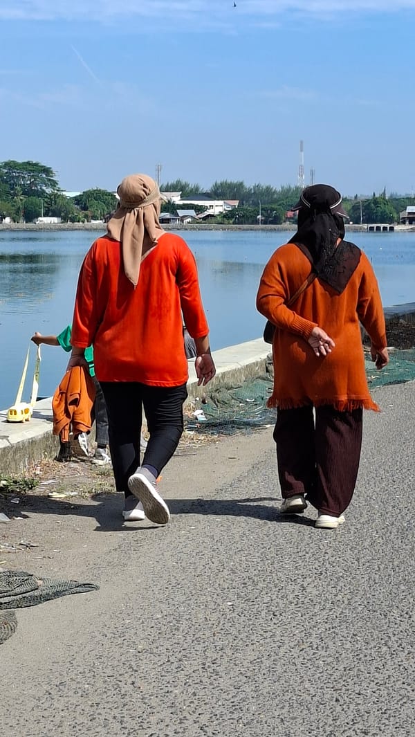 Lhokseumawe waterfront: fishing boats, wildlife, and shoreline life